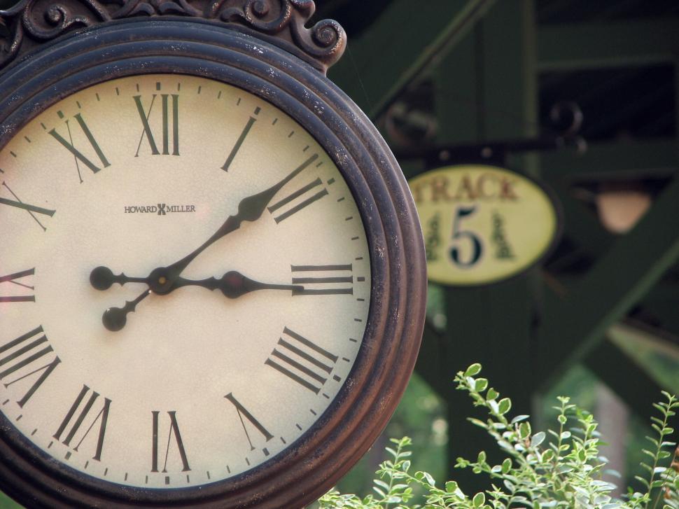 Free Image of Closeup of a clock at a railroad station 