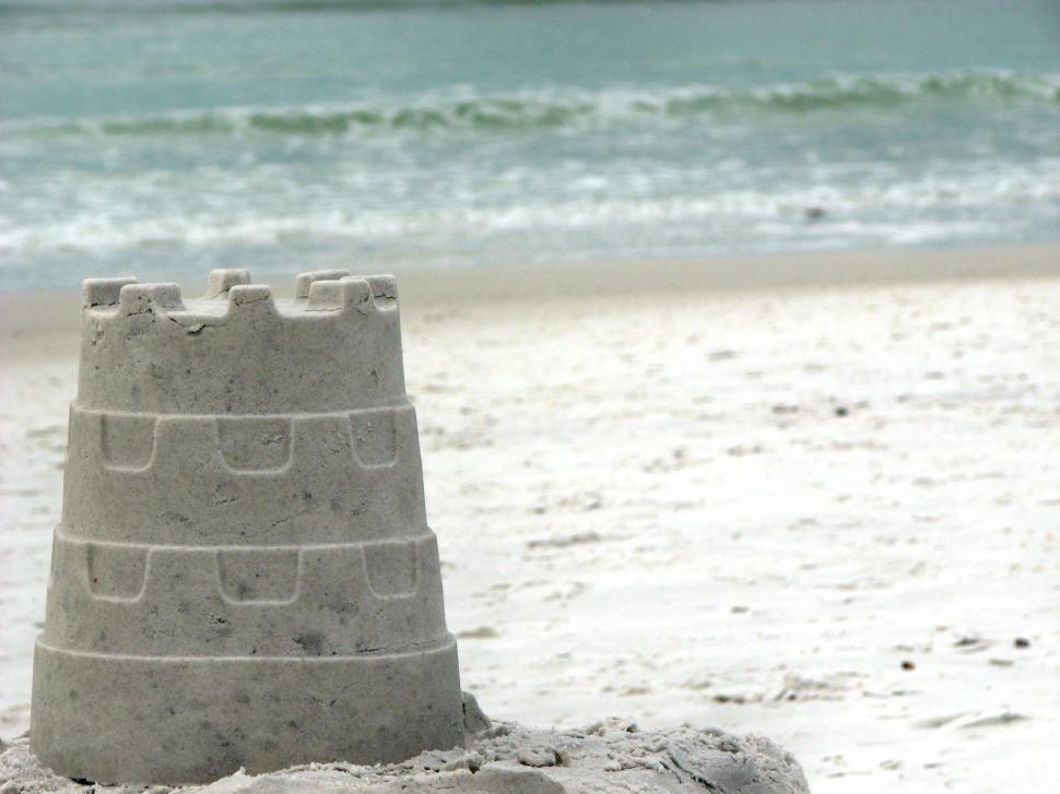 Free Image of A sandcastle overlooking the ocean 