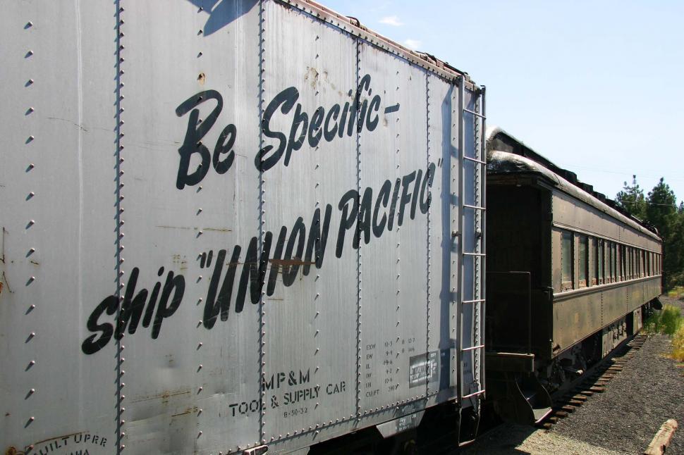 Free Image of train california rivet metal word words specific be union pacific boxcar railroad ladder shipping tool supply car 