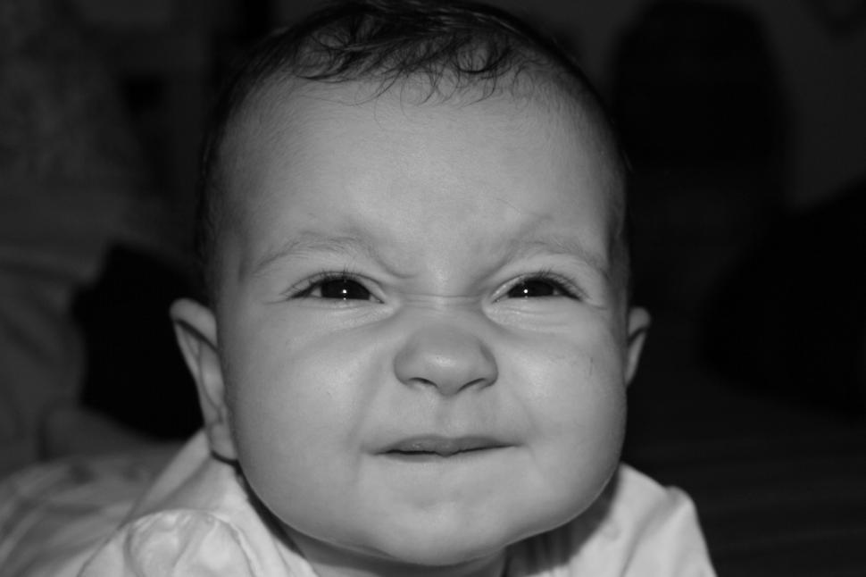 Free Image of Baby with a funny face 