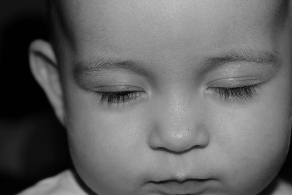 Free Image of Baby with eyes closed 