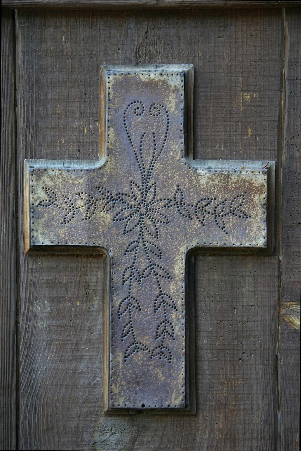 Free Image of Metal Cross on Wooden Door 