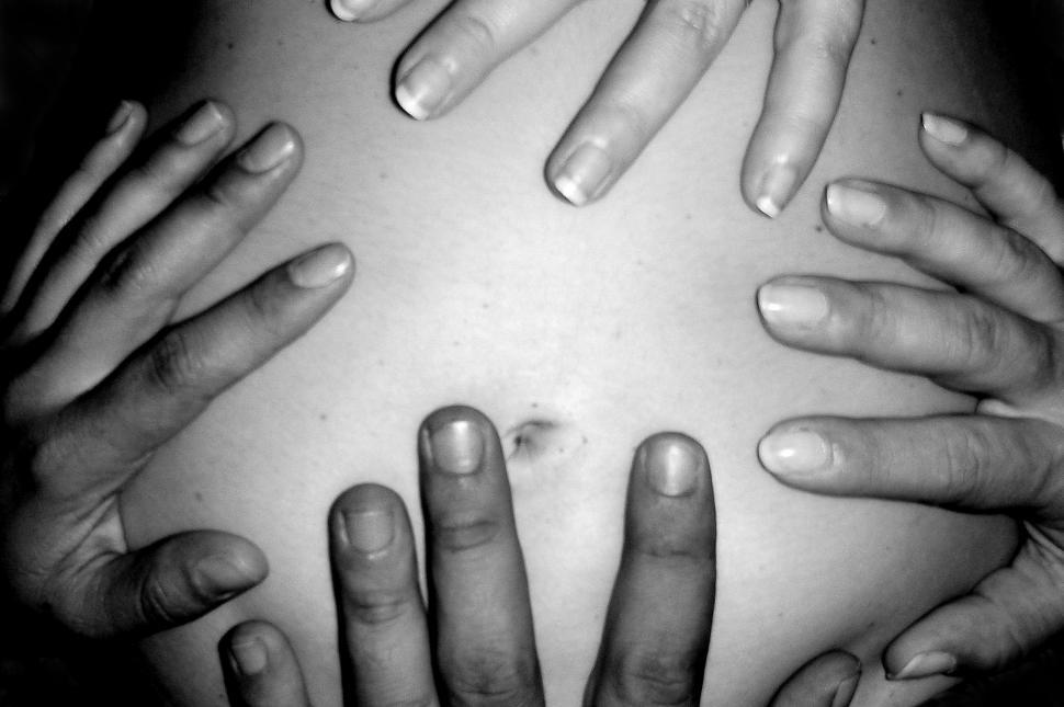 Free Image of Hands on a pregnant belly 