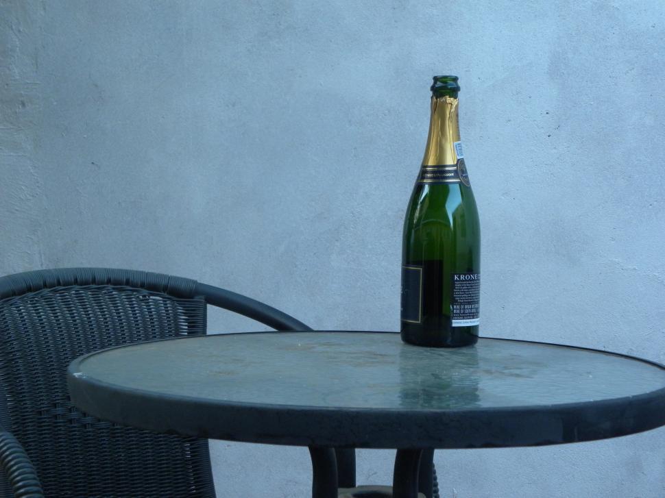 Free Image of Bottle of Sparkling wine on a table 