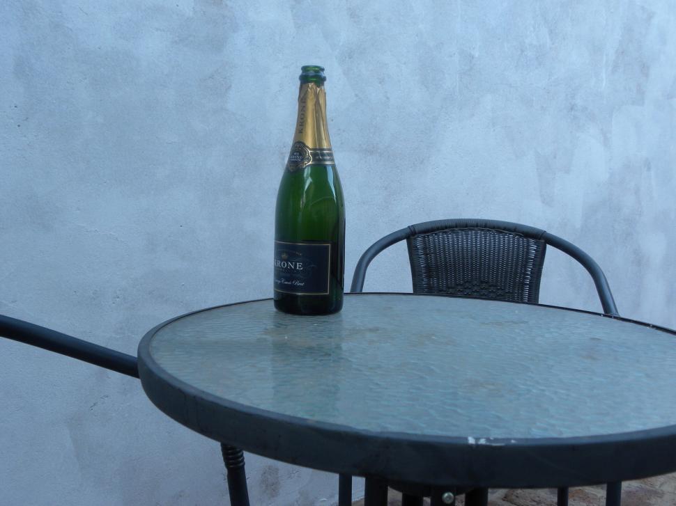Free Image of Bottle of Sparkling wine on a table 