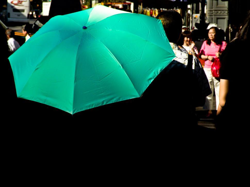 Free Image of Green Umbrella in the market 