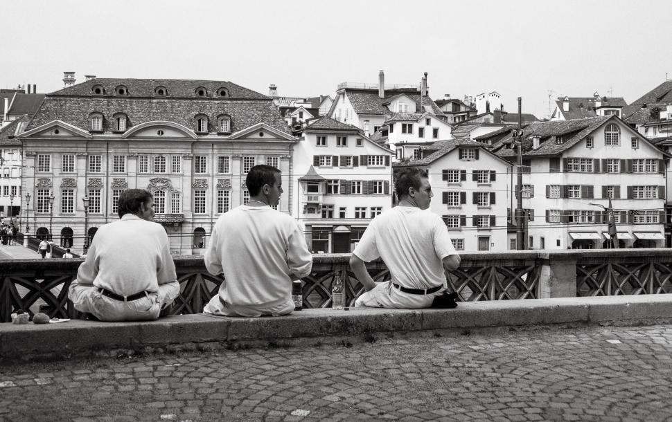 Free Image of Three young men on terrace  
