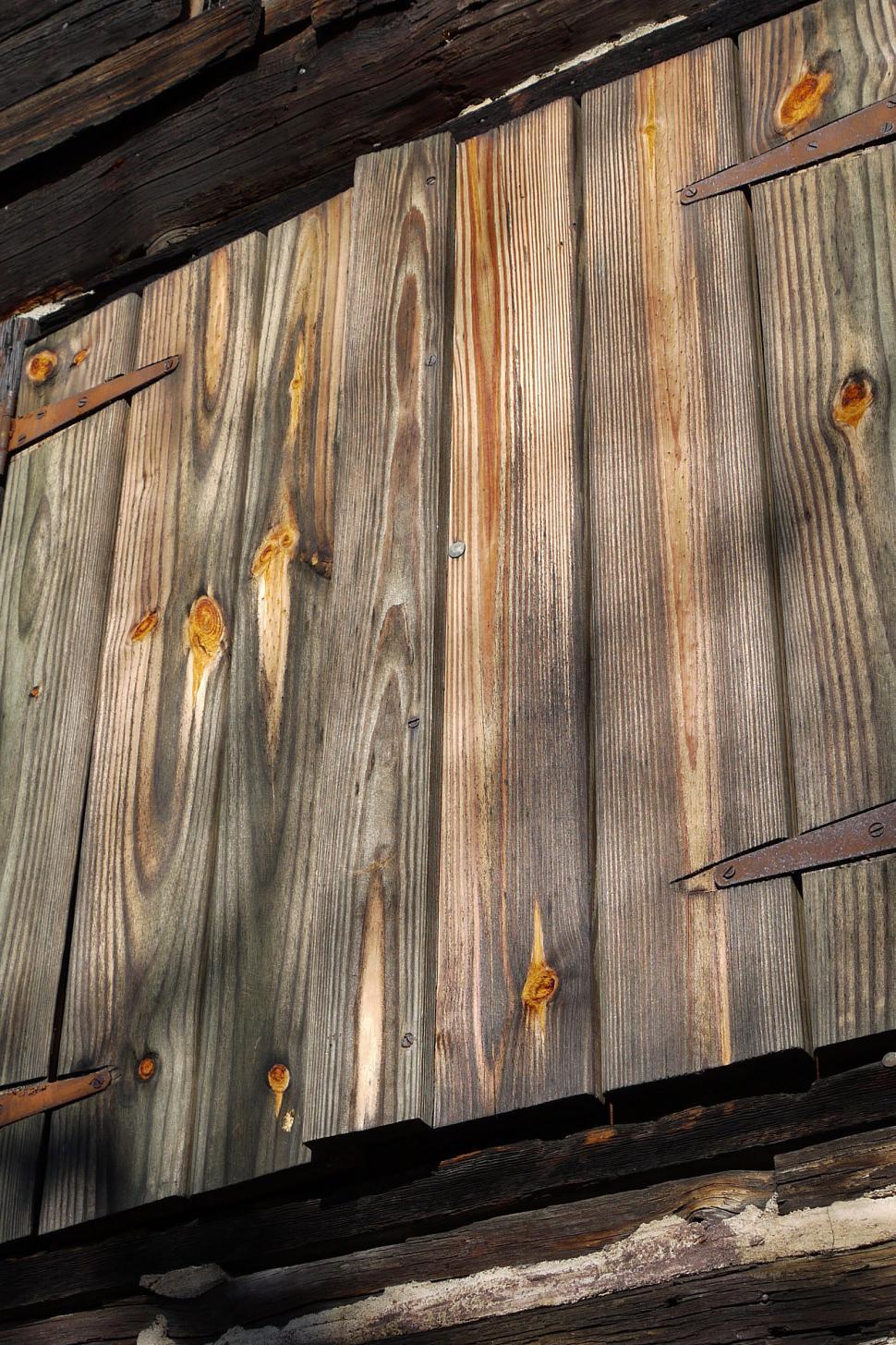 Free Image of Wooden Shutters Of A Log Cabin In The Woods 