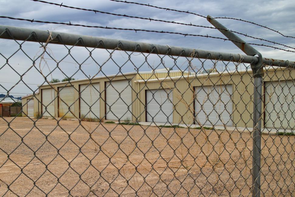 Free Image of Chain link fence and storage 