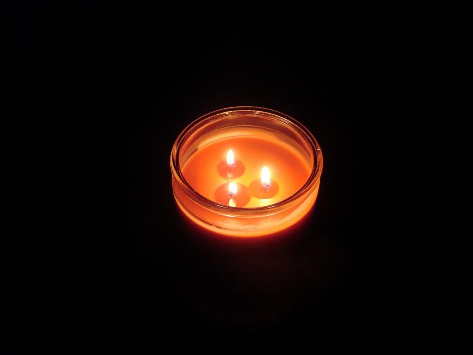 Free Image of Orange candle burning 