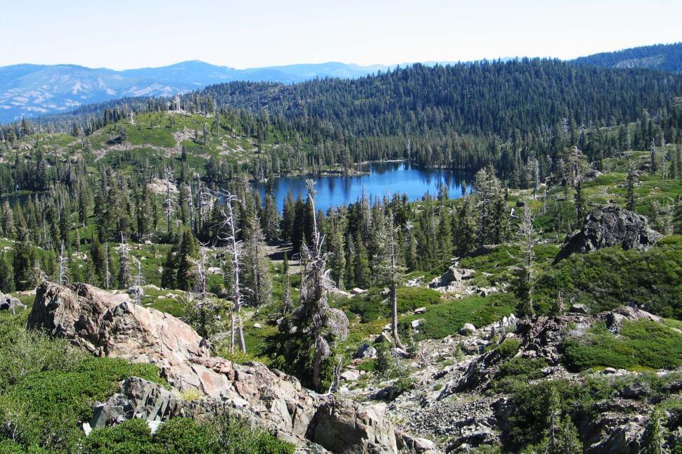 Free Image of pines rock boulder forest trees lake pond water pine buttes sierras mountain mountains california valley lakes vista view dramatic rugged 