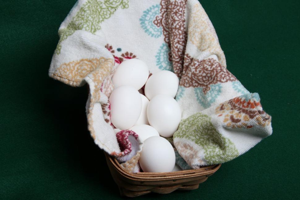 Free Image of White Eggs in a woven basket 