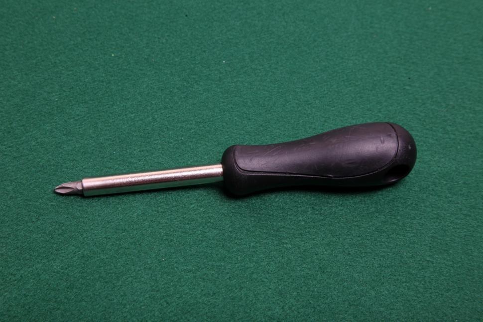 Free Image of Screwdriver on green 