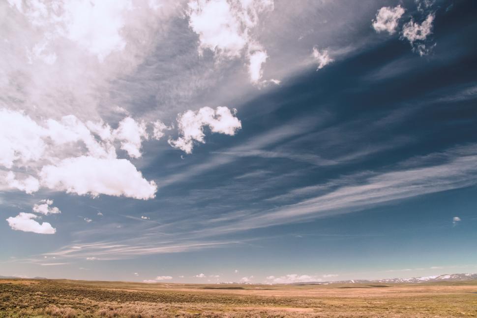 Free Image of Clouds over plains 