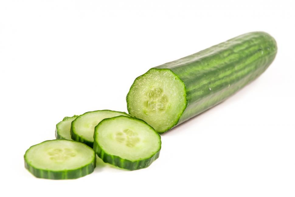 Free Image of Cucumber and slices isolated over white  