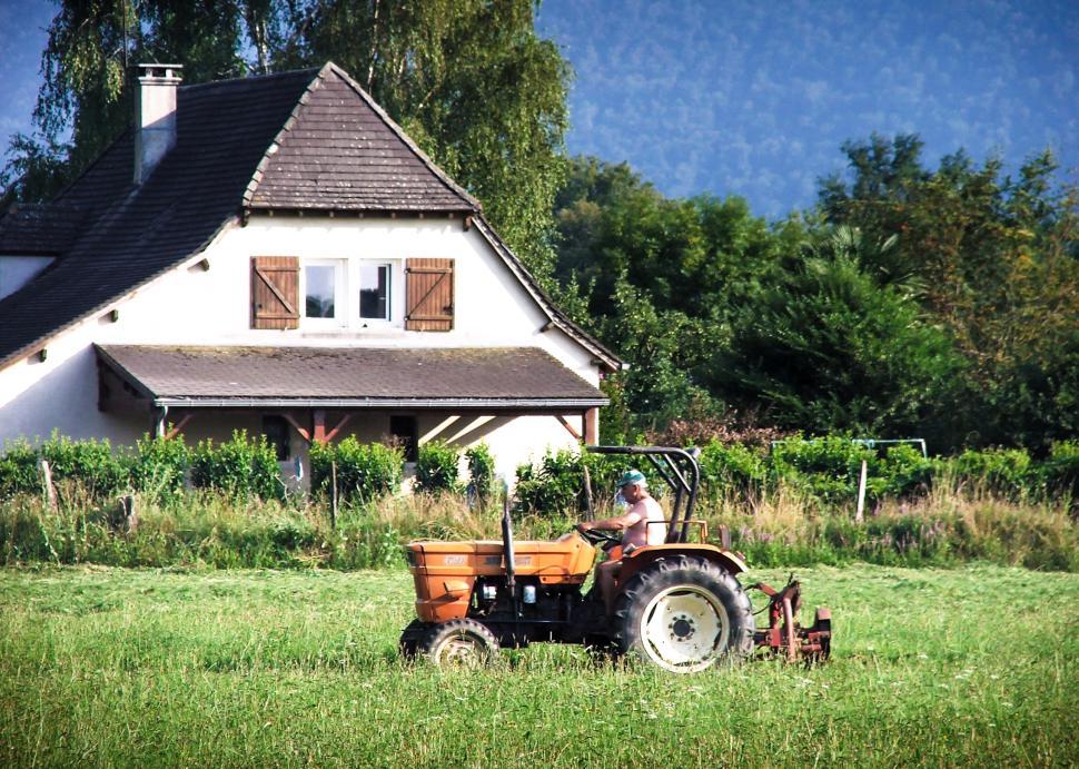 Free Image of Farmer on tractor 