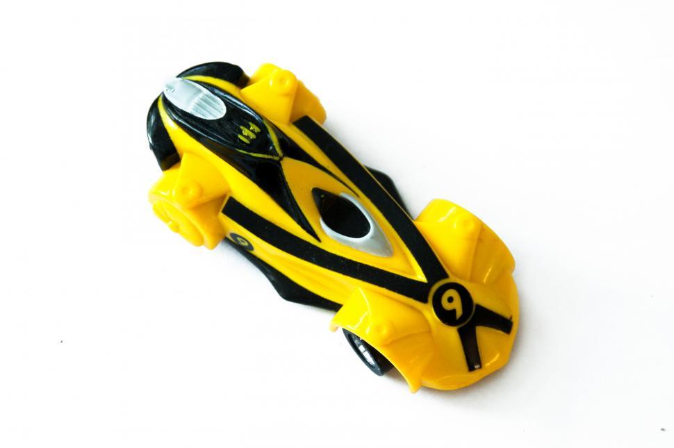 Free Image of Yellow toy race car 