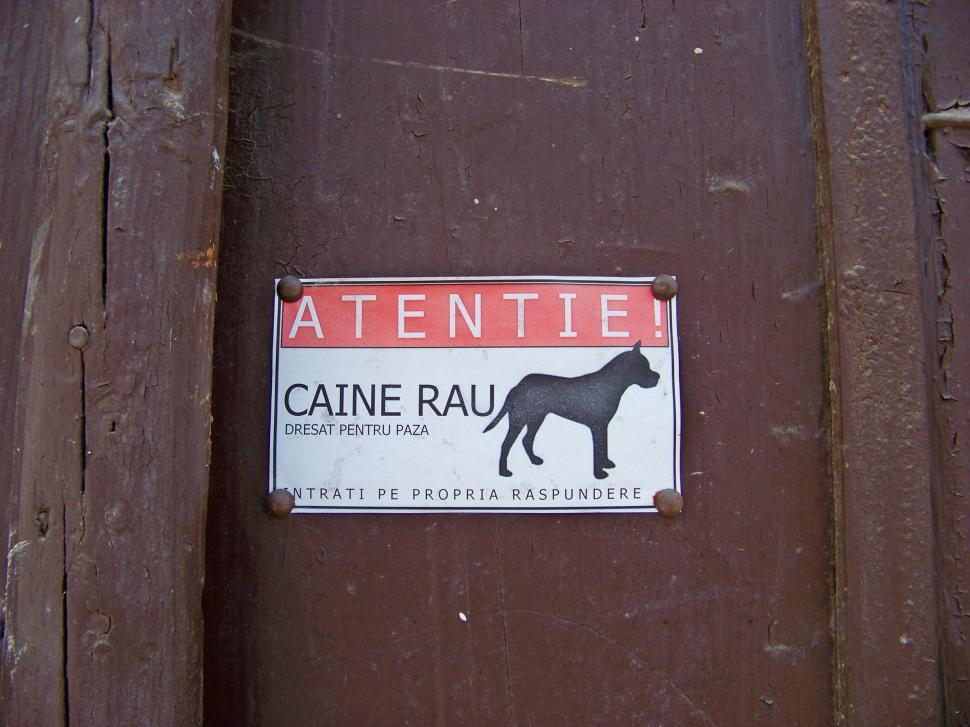 Free Image of Beware of dog sign on a gate 