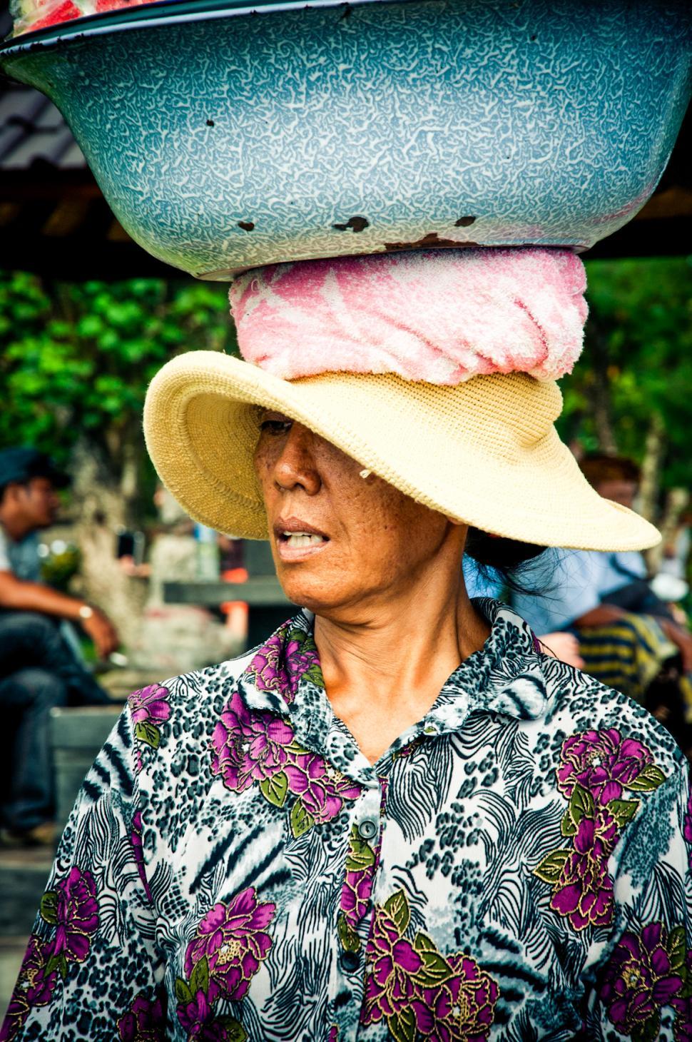 Free Image of Woman with a basket on her head 