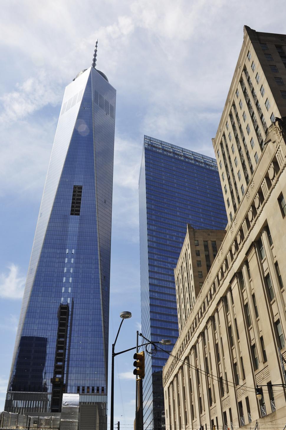 Free Image of Tall Building Overlooking Cityscape 