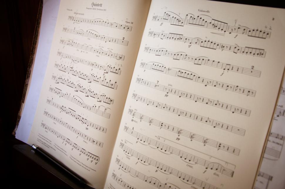 Free Image of OPen music book and notes 