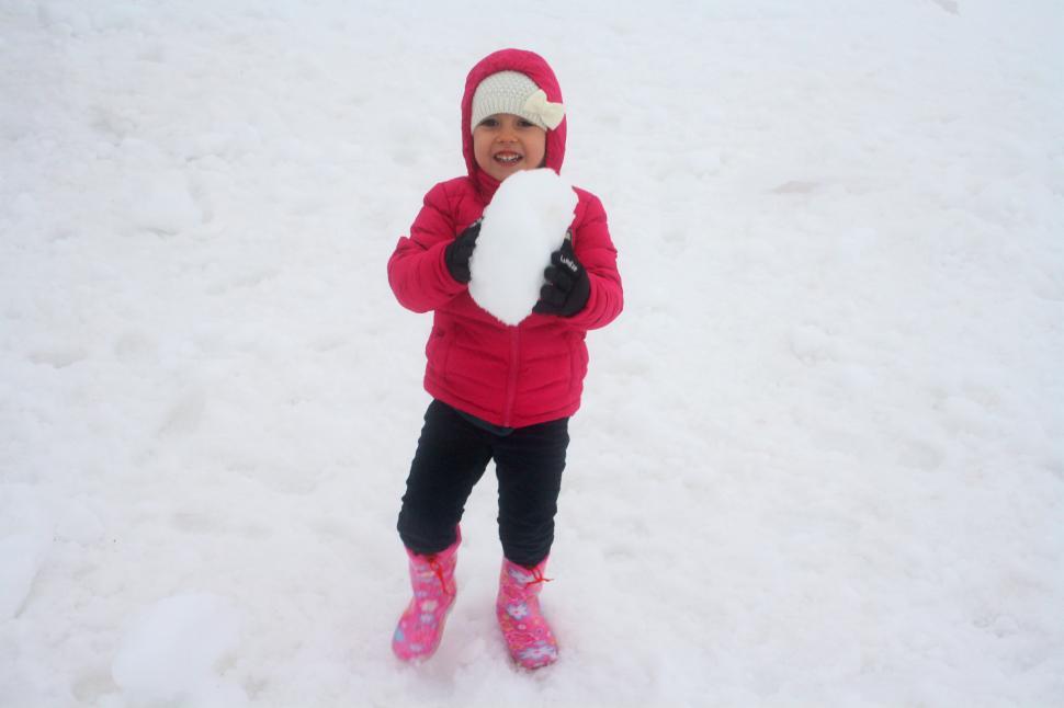 Free Image of Child playing on the snow 