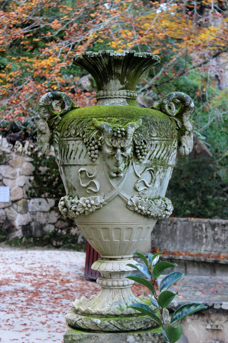 Free Image of Old Vase with Faun Face 