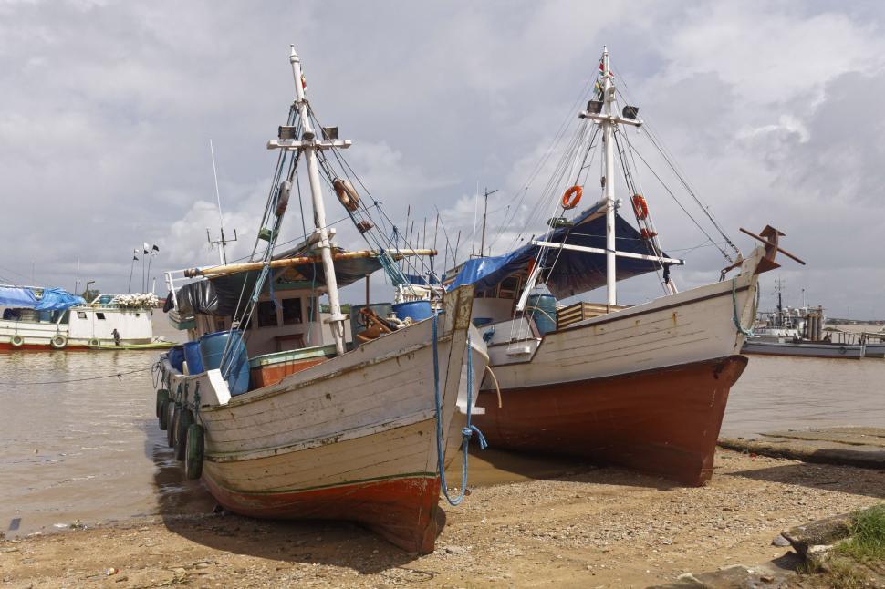 Free Image of Two Fishing Boats at Low Tide 