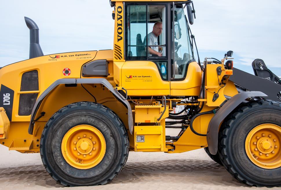 Free Image of bulldozer tractor working on a beach 