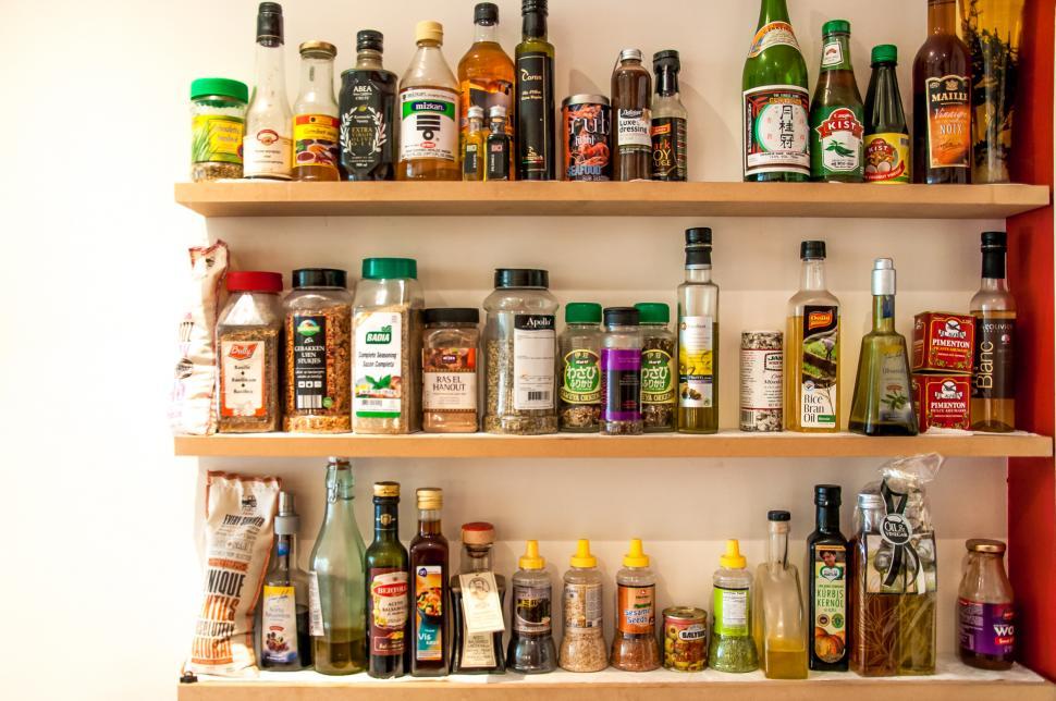 Free Image of herbs and oil bottles in kitchen 
