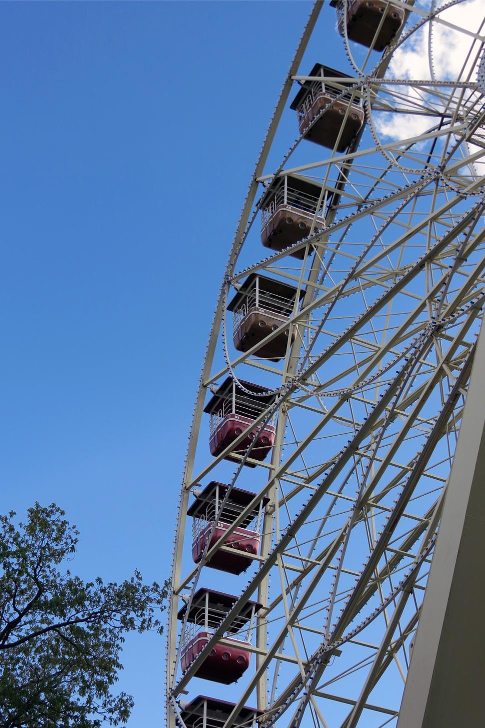 Free Image of Ferris Wheel Over Blue Sky 