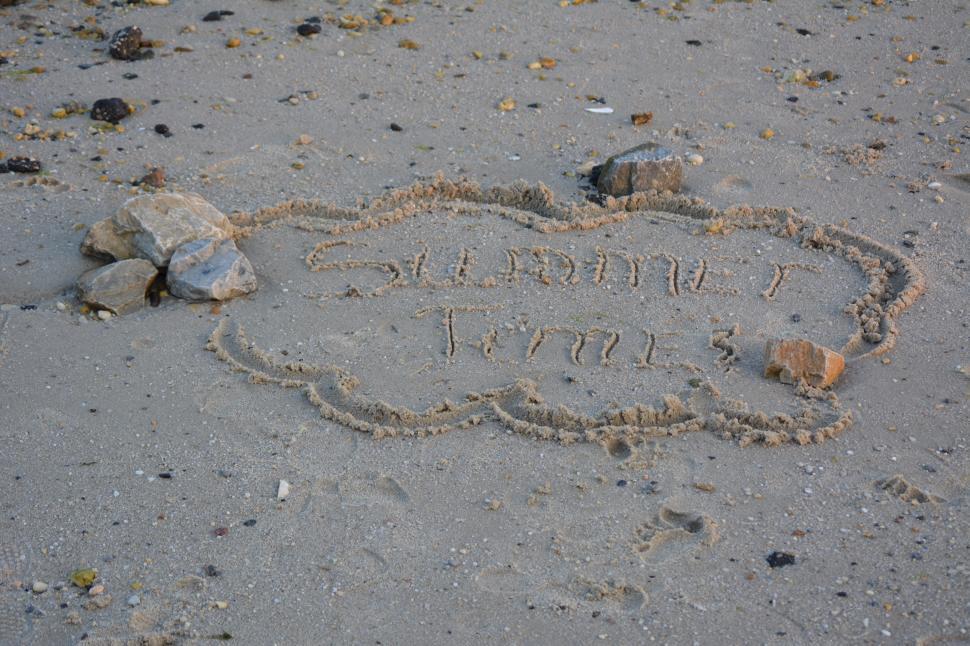 Free Image of Writing in the Sand 