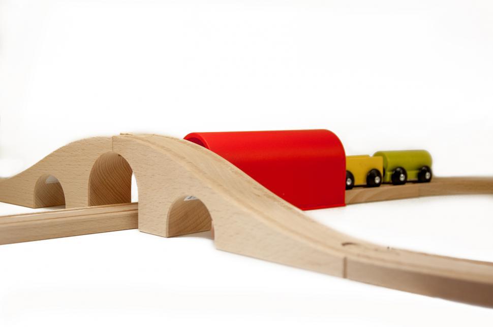 Free Image of Wooden toy train on railroad 