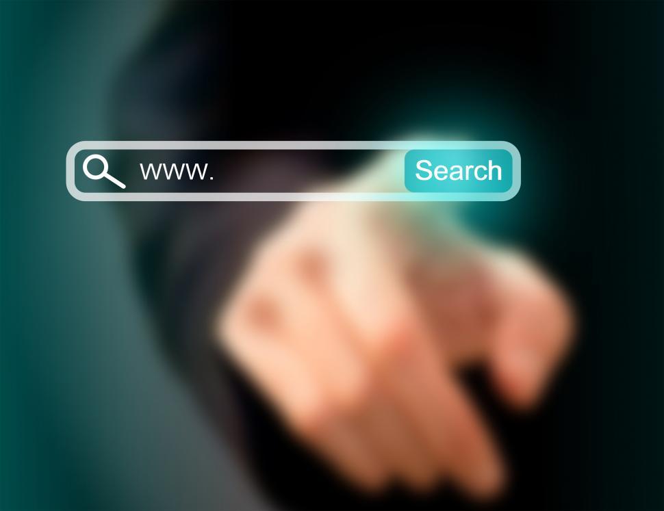 Free Image of Businessman pointing at search bar on a virtual screen 