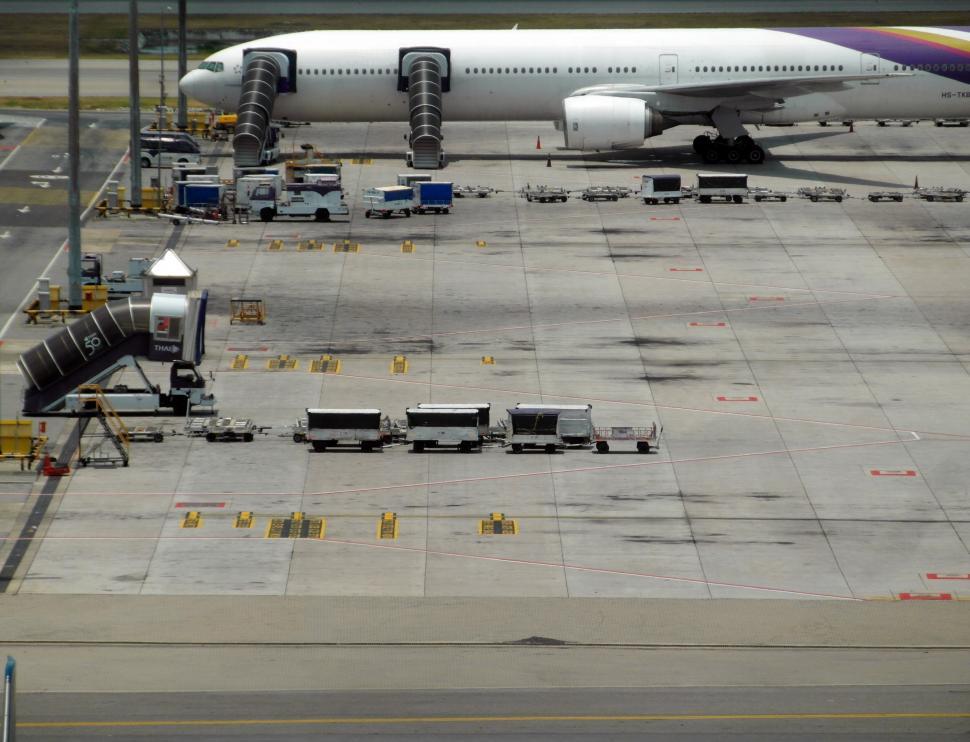 Free Image of Airplane Parked at an Airport 