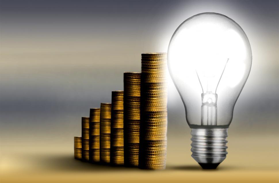 Free Image of Gold coin staircase with lightbulb - Money concept 