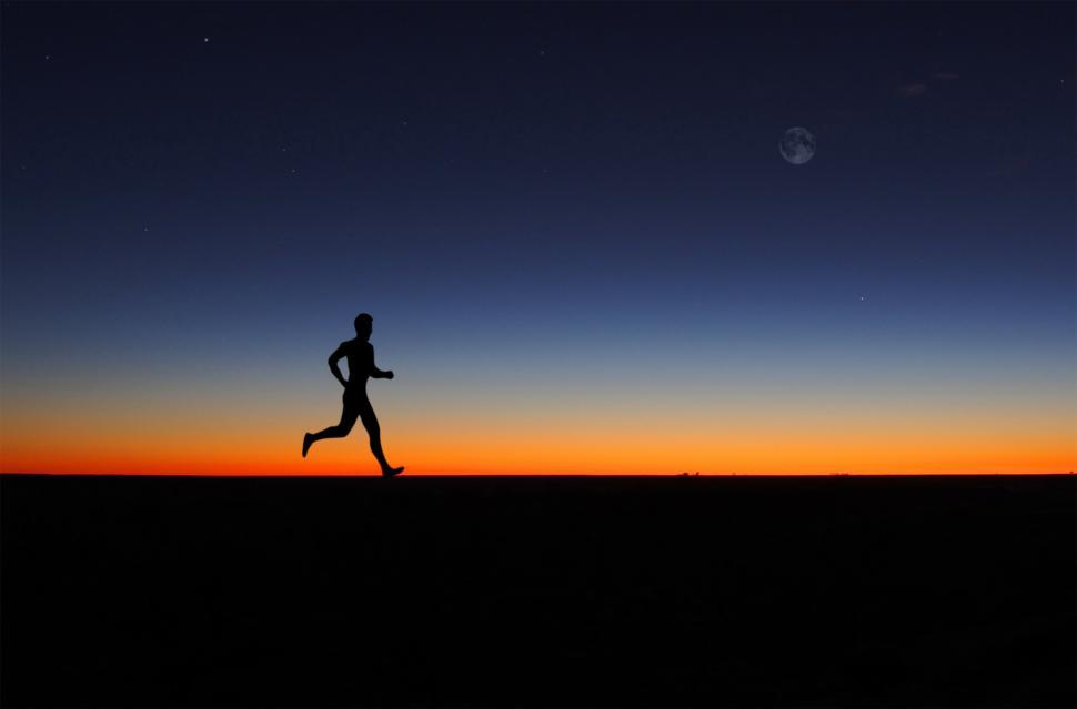 Download Free Stock Photo of Man running alone at dawn 