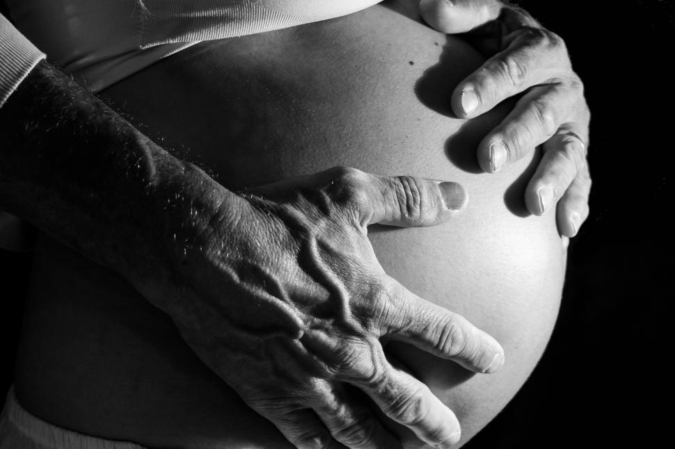 Free Image of hands on the stomach of pregnant woman  