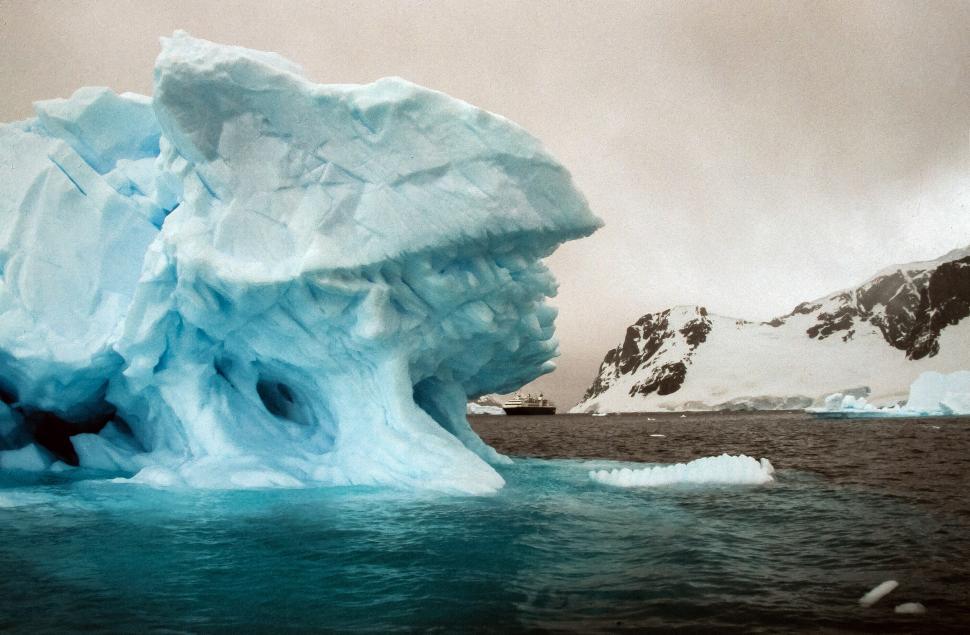 Free Image of Iceberg with cruise ship 