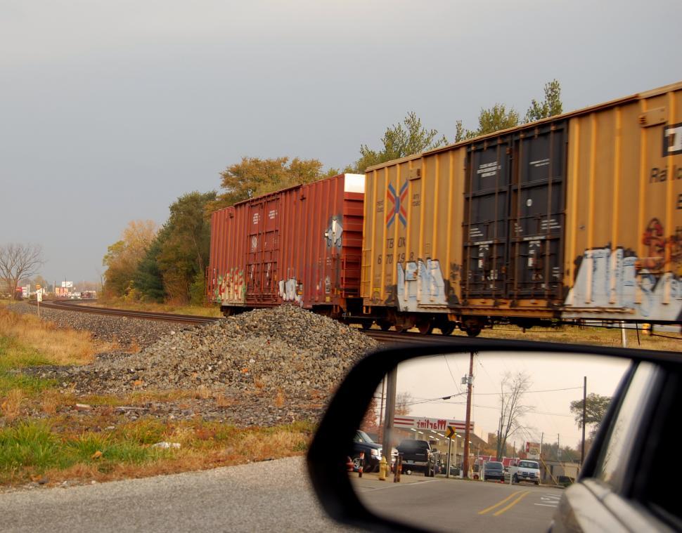 Free Image of Train and rear view mirror 