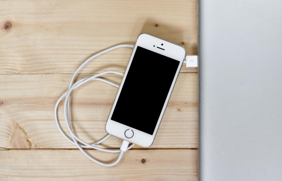 Free Image of Phone plugged in 
