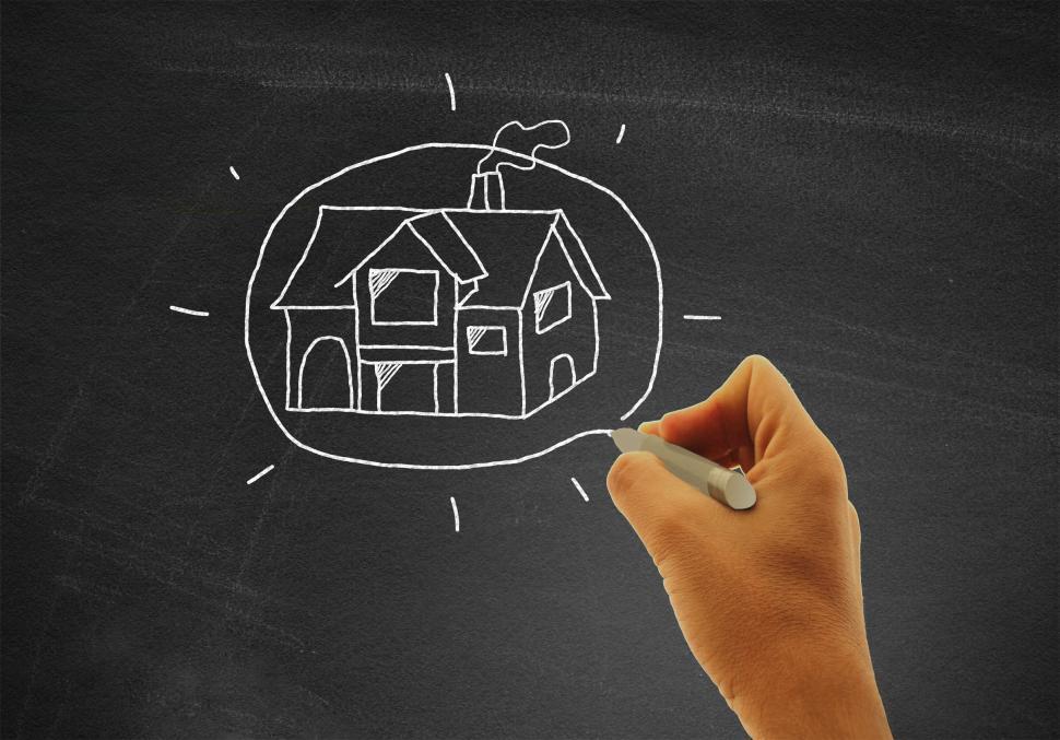 Download Free Stock Photo of Hand drawing a house on blackboard - Real estate and housing con 