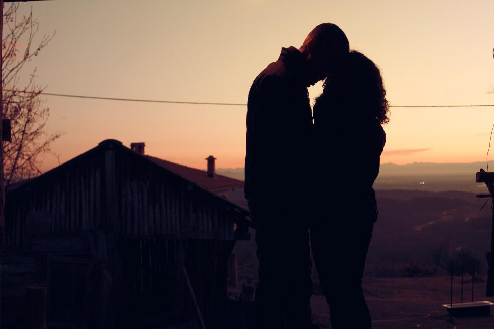 Download Free Stock Photo of Kissing at sunset 