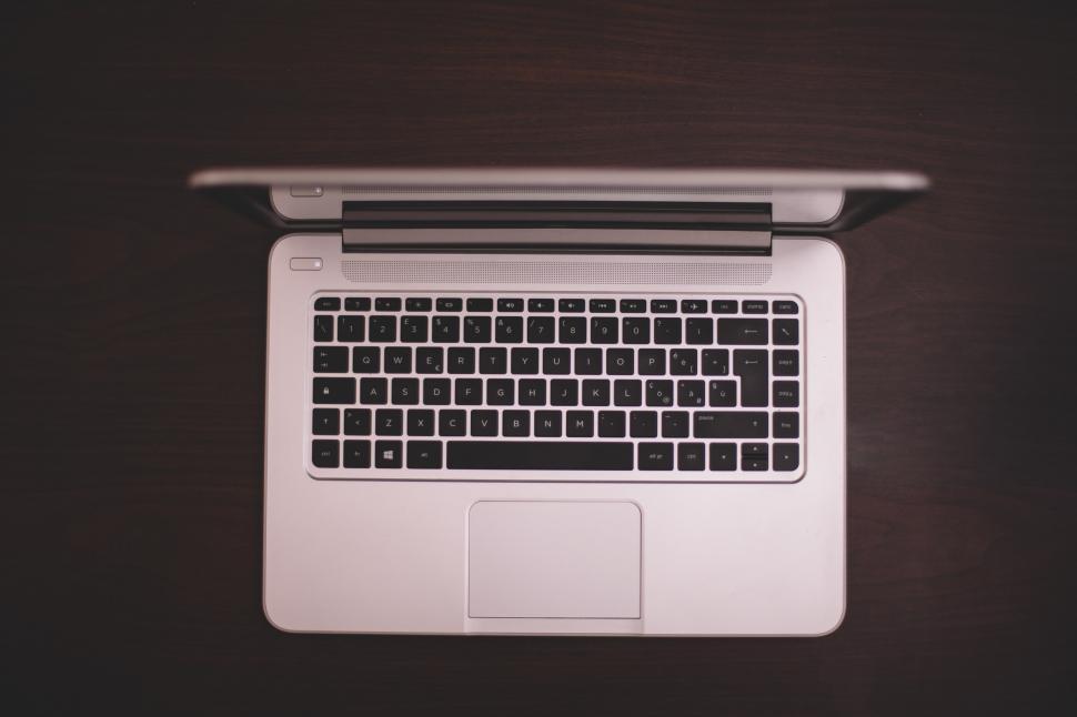 Free Image of White Laptop Computer on Table 