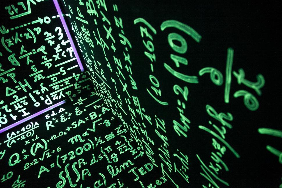 Free Image of Dark Room Filled With Green Writing 