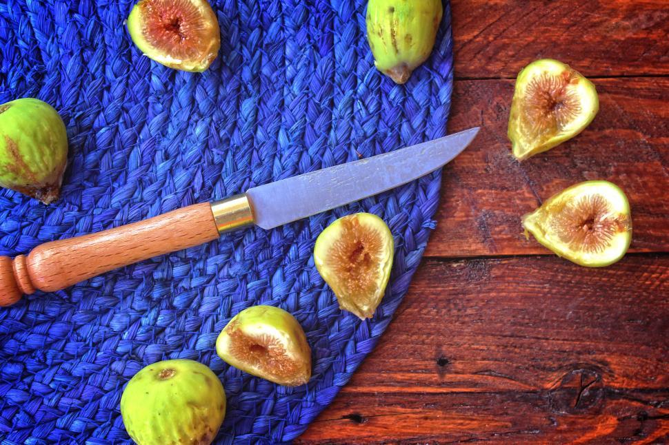 Free Image of Summer s end - The last wild figs of the season sliced on the ta 