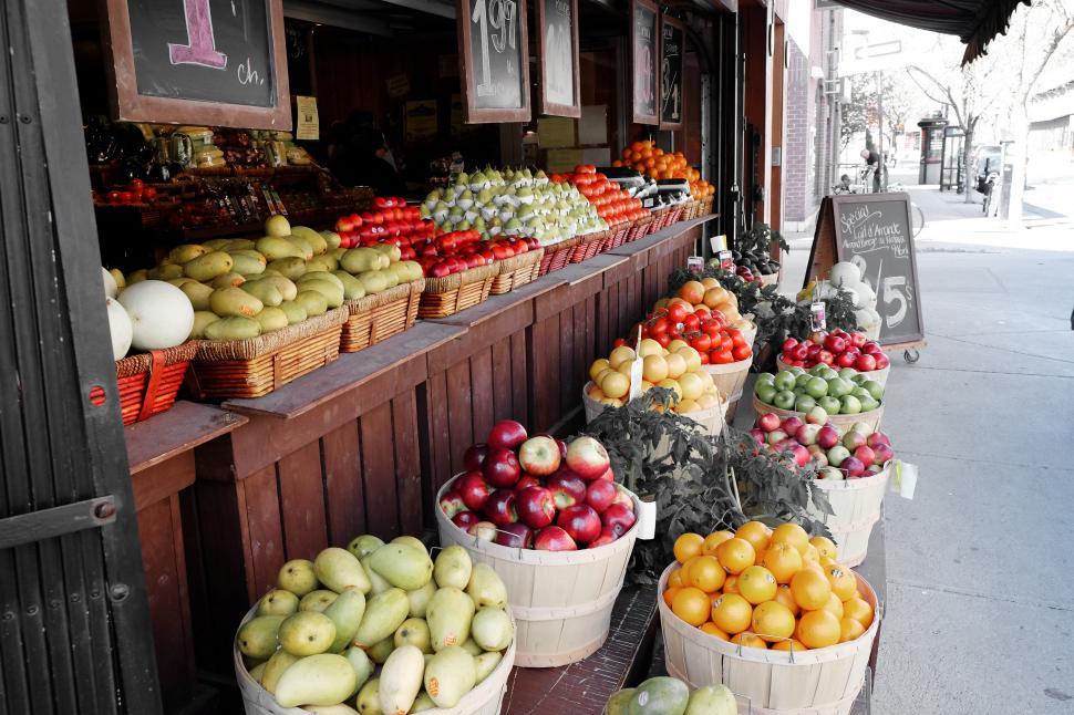 Free Image of Baskets of Fruit on Sidewalk 