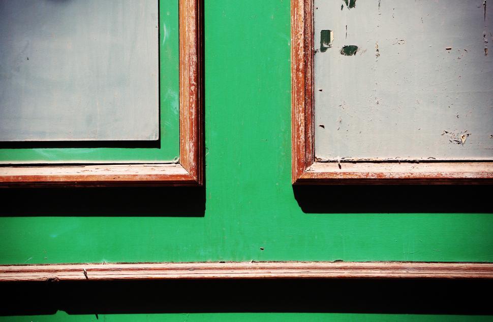 Free Image of Close Up of Green Door With Two Windows 