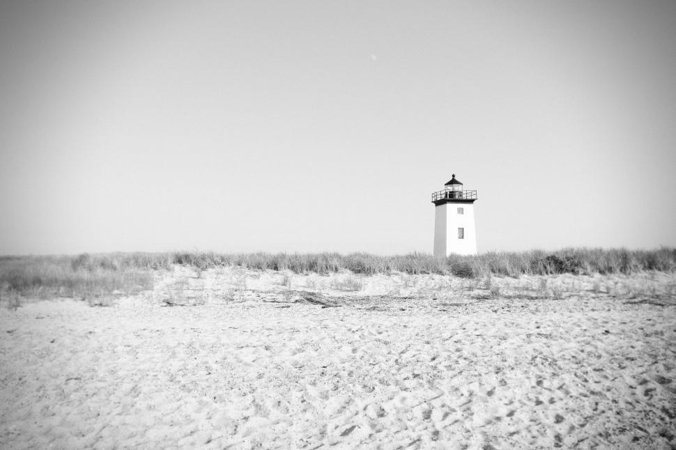 Free Image of Black and White Photo of a Lighthouse 