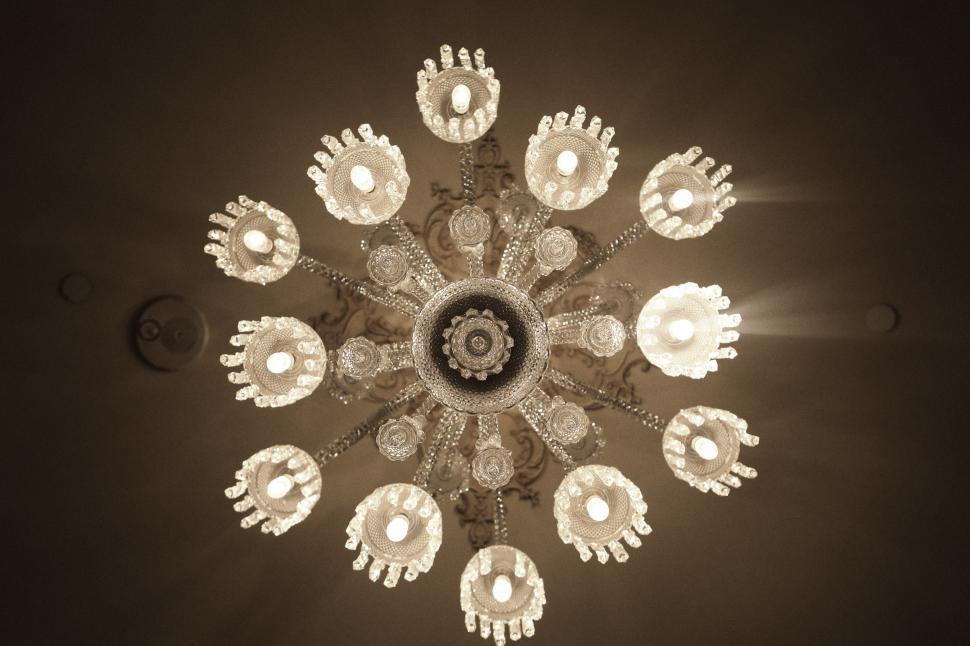 Free Image of Chandelier Hanging From Ceiling in Room 